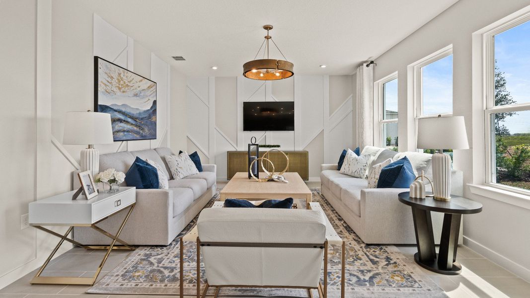 The First Floor Living Area in the Model Highbourne by DRB Homes in Hamilton Bluff located in Haines City, FL. The First Floor Living Area in the Model Highbourne by DRB Homes in Hamilton Bluff located in Haines City, FL.