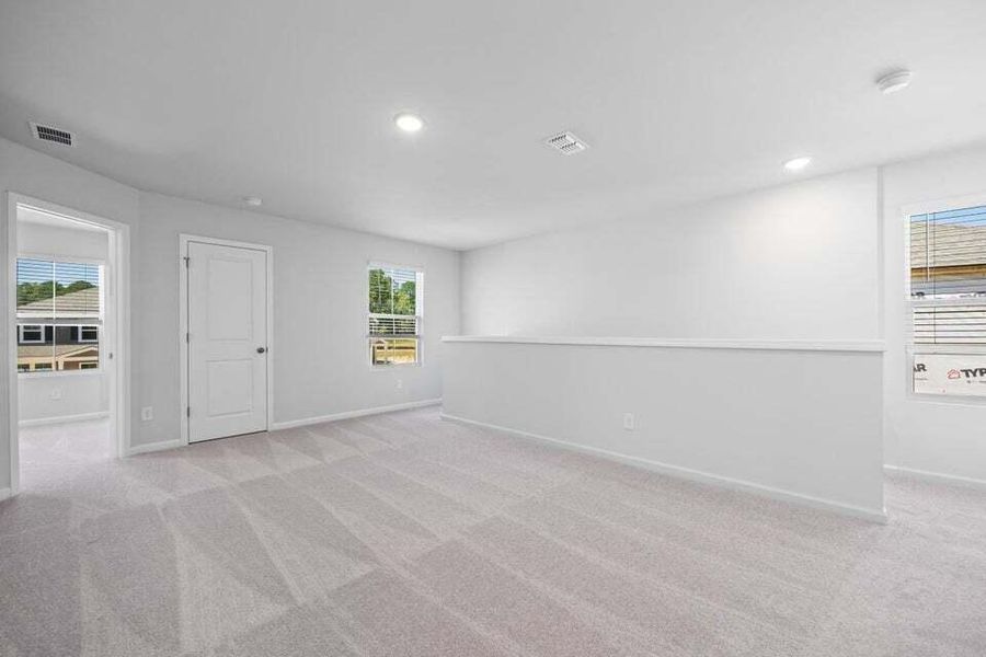 Spacious, unfurnished interior of a new home in Nexton, Summerville (Image 5).