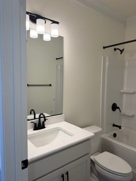 Furnished interior view inside a new home in Royal Pines, Trinity (Image 9).