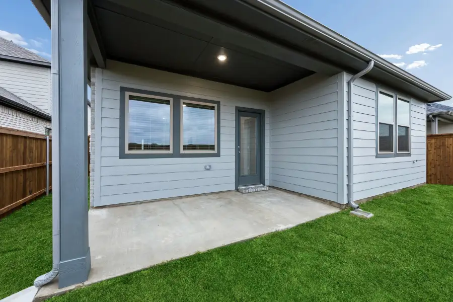 Covered Patio in the Cedar home plan by Trophy Signature Homes – REPRESENTATIVE PHOTO Covered Patio in the Cedar home plan by Trophy Signature Homes – REPRESENTATIVE PHOTO