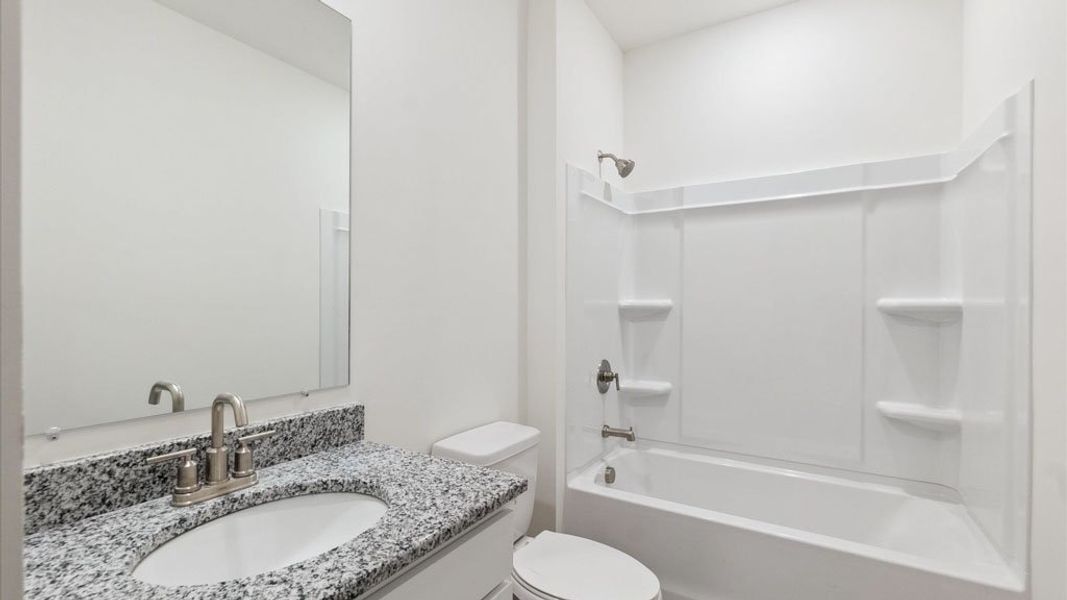 Representative furnished interior of a home built from the Freeport by D.R. Horton in The Hideaway at Fox Meadows, Bluff City (Image 5).