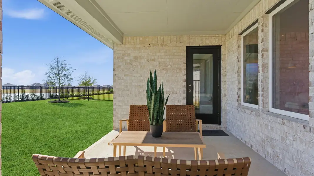 Exterior details and patio area of a home in Lago Mar 55' Homesites, Texas City (Image 2). Exterior details and patio area of a home in Lago Mar 55' Homesites, Texas City (Image 2).