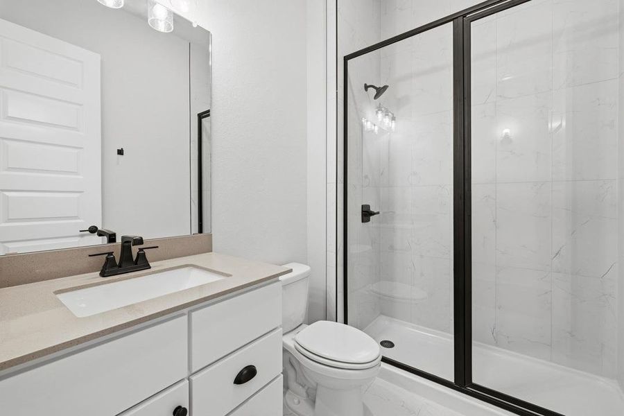 Furnished interior view inside a new home in Heritage, Dripping Springs (Image 10).