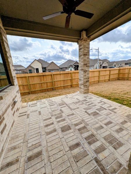 Exterior details and patio area of a home in Artavia, Conroe (Image 19).