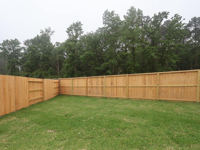 Exterior details and patio area of a home in Moran Ranch, Willis (Image 3).
