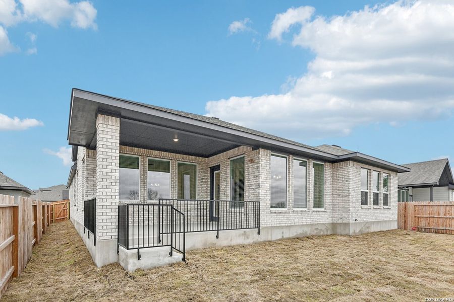 Exterior details and patio area of a home in Village at Three Oaks, Seguin (Image 2). Exterior details and patio area of a home in Village at Three Oaks, Seguin (Image 2).
