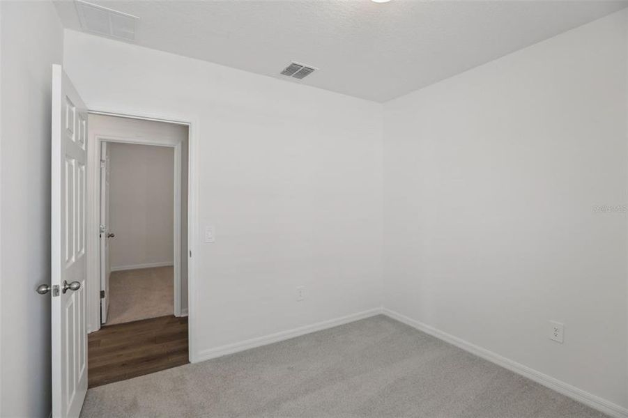 Spacious, unfurnished interior of a new home in Springs at Lake Alfred - Classic Series, Lake Alfred (Image 37).