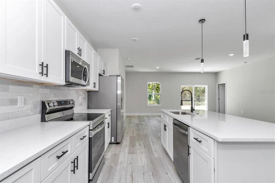 Furnished interior view inside a new home in , Poinciana (Image 3). Furnished interior view inside a new home in , Poinciana (Image 3).