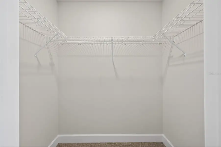 Spacious, unfurnished interior of a new home in Hill Country Estates, Dade City (Image 30).