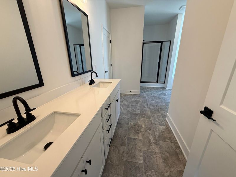 Furnished interior view inside a new home in Wood Creek Landing, Leland (Image 13).