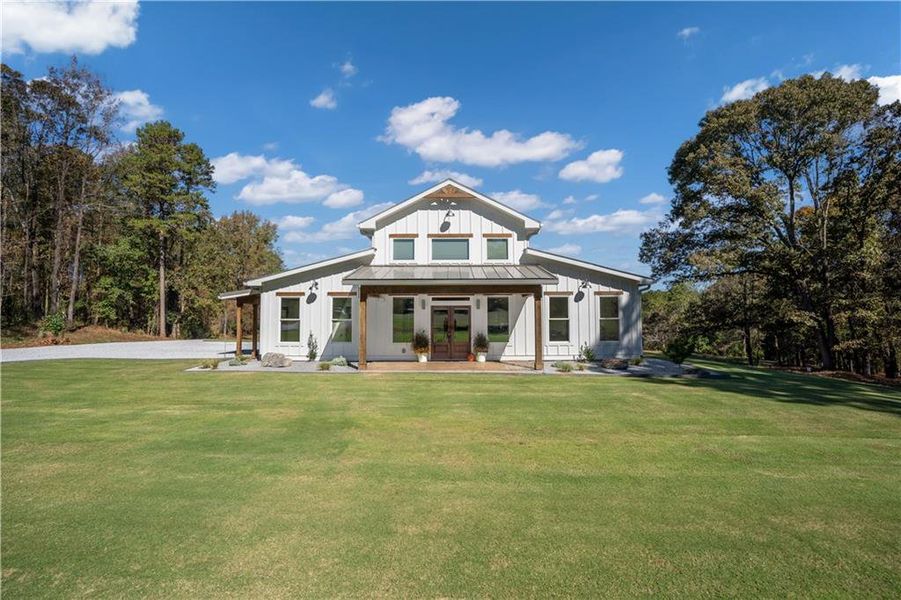 Front exterior of a new home in , Maysville, GA, highlighting curb appeal (Image 24). Front exterior of a new home in , Maysville, GA, highlighting curb appeal (Image 24).