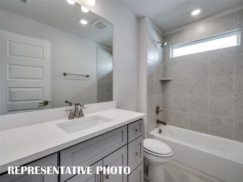 Friends and family will feel right at home in either of the guest baths in this dream home!  REPRESENTATIVE PHOTO