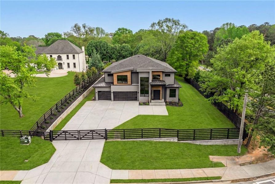 Front exterior of a new home in , Sugar Hill, GA, highlighting curb appeal (Image 27). Front exterior of a new home in , Sugar Hill, GA, highlighting curb appeal (Image 27).