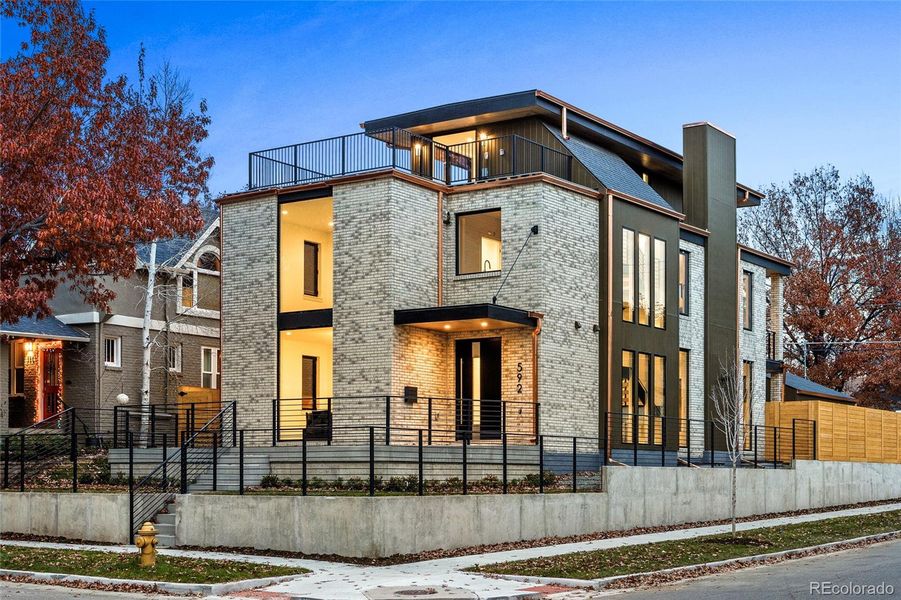 Front exterior of a new home in , Denver, CO, highlighting curb appeal (Image 1).