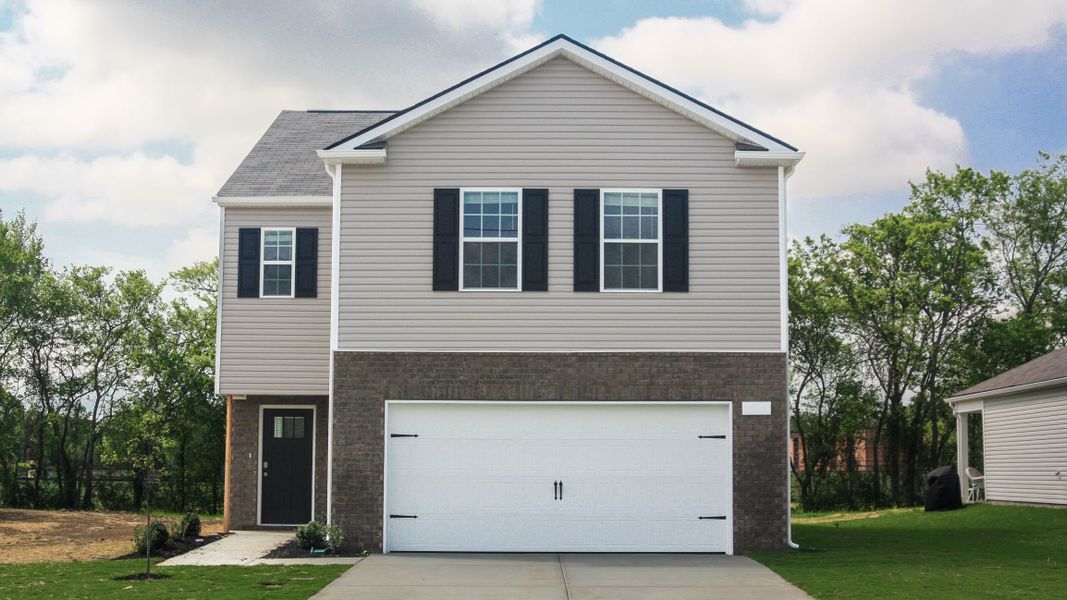 Front exterior of a new home in Paddington Place, Baxter, TN, highlighting curb appeal (Image 1). Front exterior of a new home in Paddington Place, Baxter, TN, highlighting curb appeal (Image 1).
