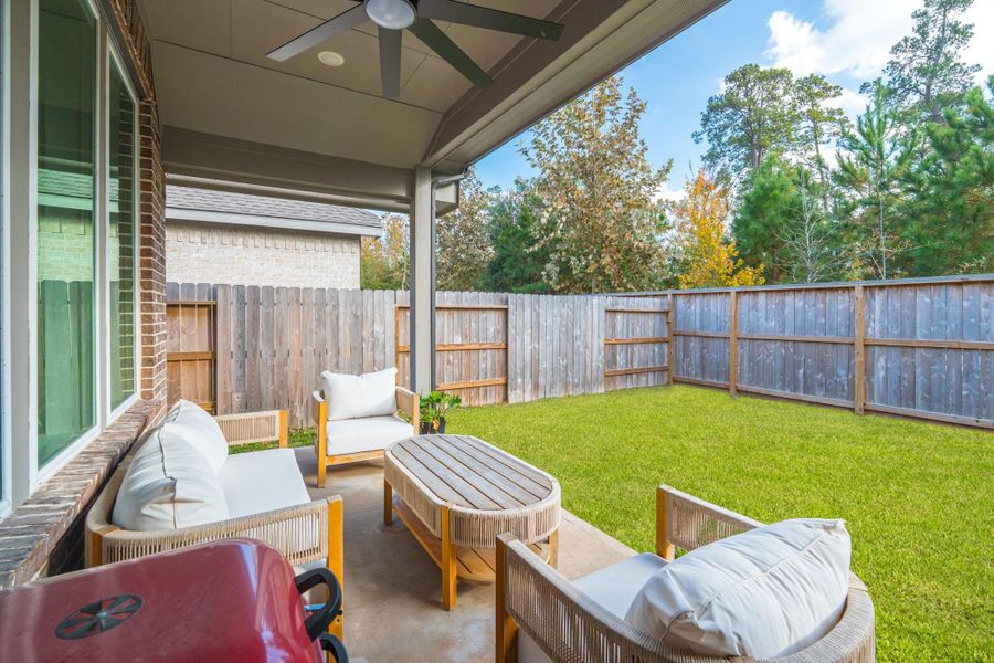Exterior details and patio area of a home in Grand Central Park, Conroe (Image 4).