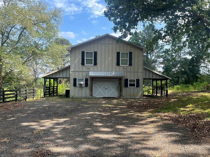 Front exterior of a new home in , Ball Ground, GA, highlighting curb appeal (Image 28).