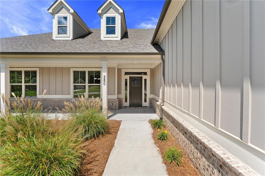 Front exterior of a new home in , Jefferson, GA, highlighting curb appeal (Image 21).