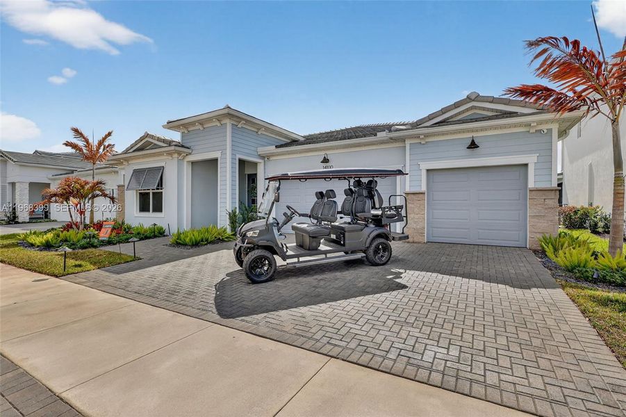 Cruise in style with this 2025 six-seater golf cart, featuring LED lighting, Bluetooth speakers, and custom rims. Perfect for exploring Tradition with family and friends. Included with the sale, this home is move-in ready, offering a seamless blend of luxury, comfort, and outdoor lifestyle.