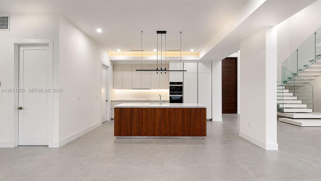 Furnished interior view inside a new home in , Miami Lakes (Image 58).