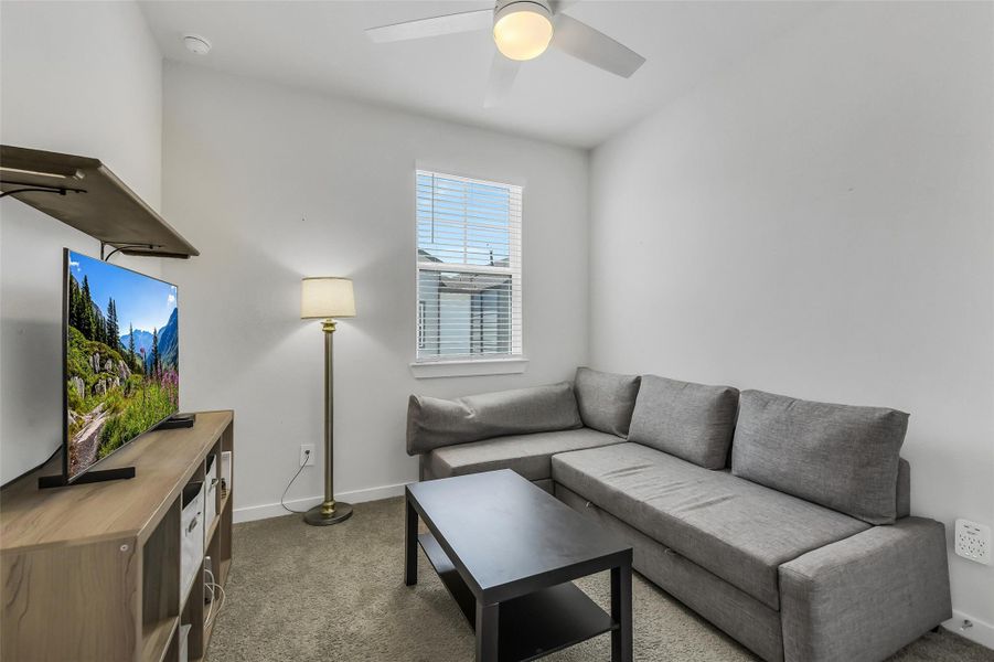 Spacious upstairs game room or media area ideal for movie nights, entertaining guests, or creating a second living space.