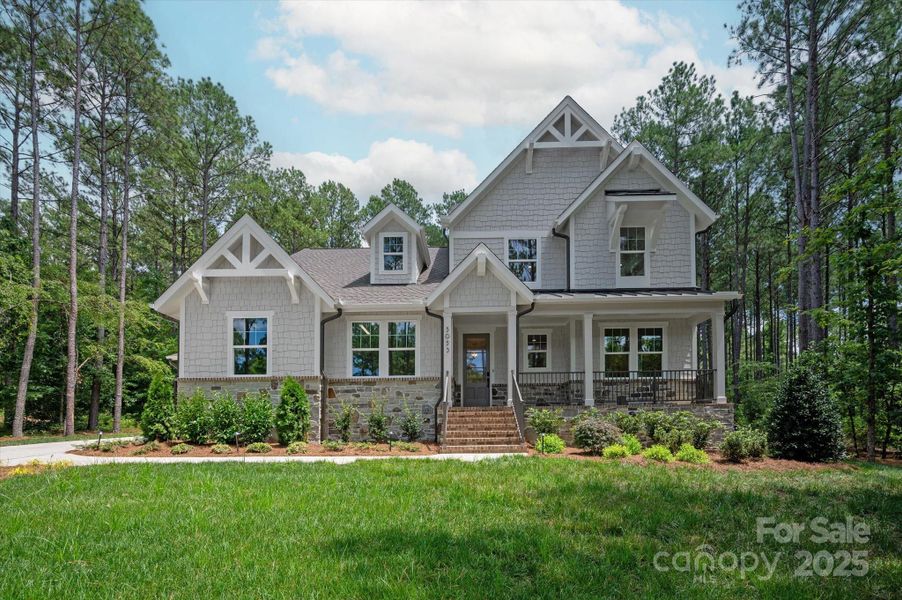 Front exterior of a new home in , Lancaster, SC, highlighting curb appeal (Image 1).