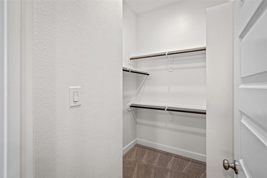 Walk-in Closet 2: Second separate walk-in closet for ultimate his-and-hers storage.
