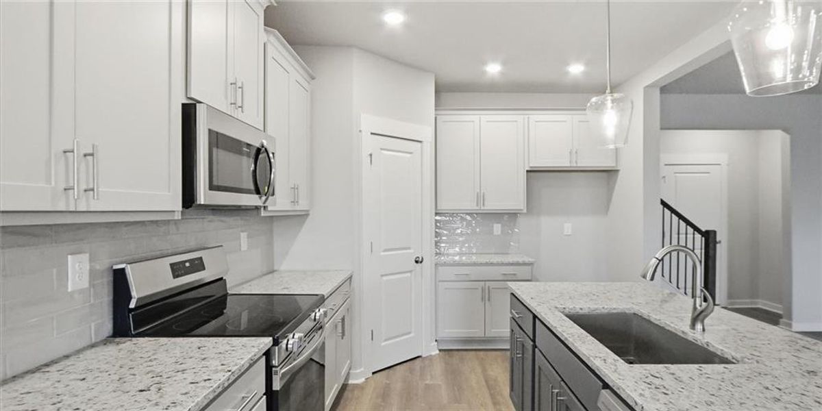 Furnished interior view inside a new home in Traditions of Braselton, Jefferson (Image 11).