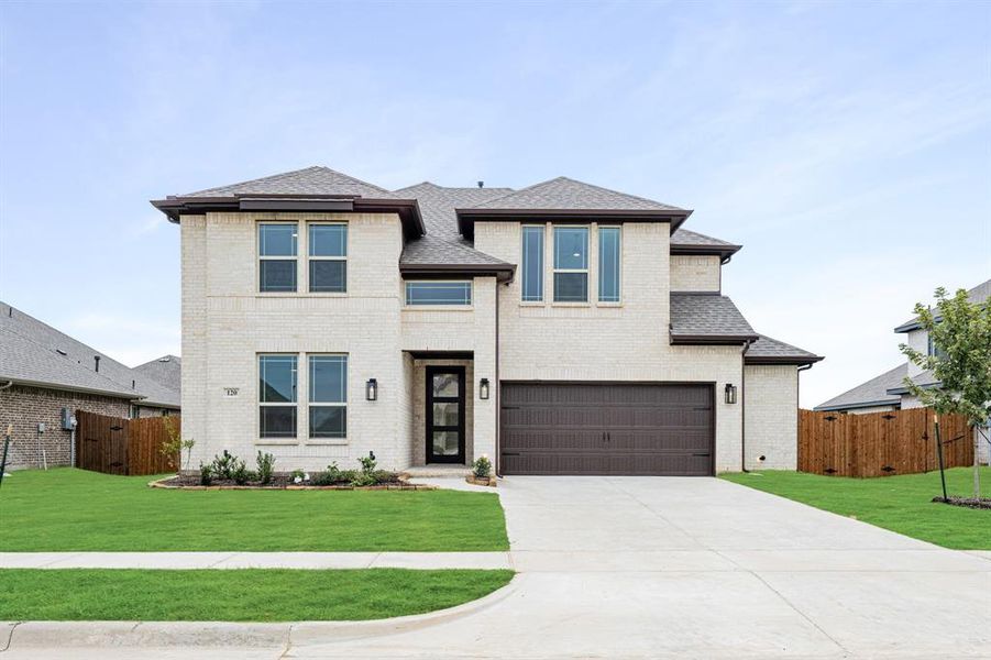Front exterior of a new home in Hampton Park, Glenn Heights, TX, highlighting curb appeal (Image 2).