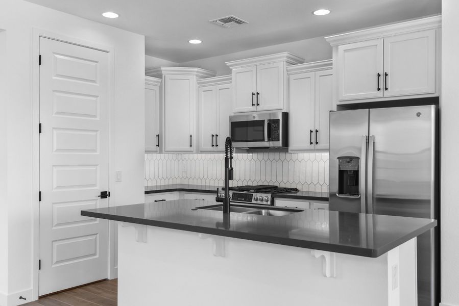 Furnished interior view inside a new home in CantaMia at Estrella 55+, Goodyear (Image 18).