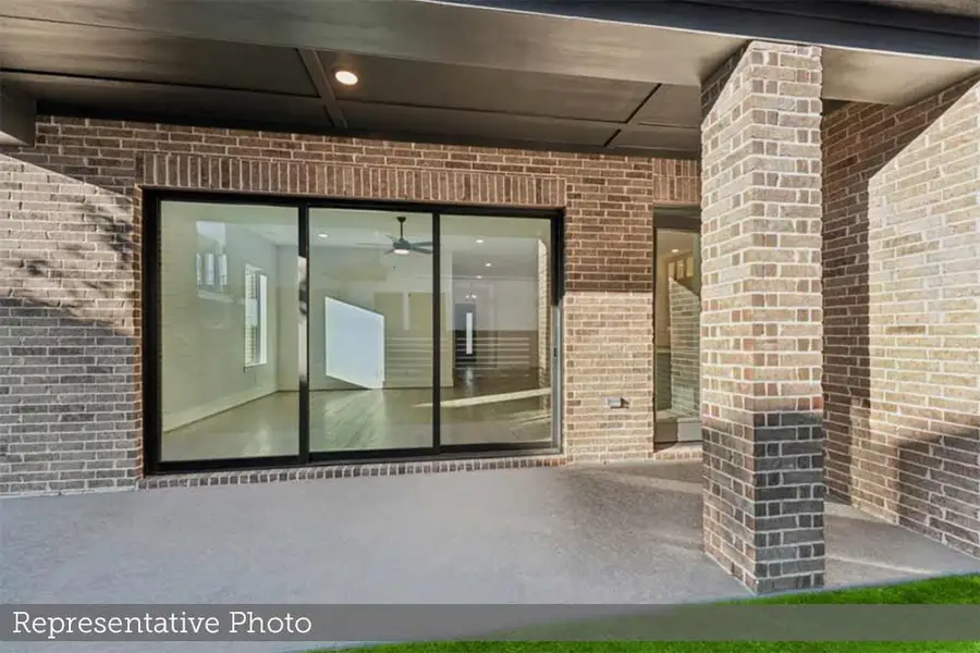 Exterior details and patio area of a home in Easthaven at Bridgeland Central - Vision Collection, Cypress (Image 3).