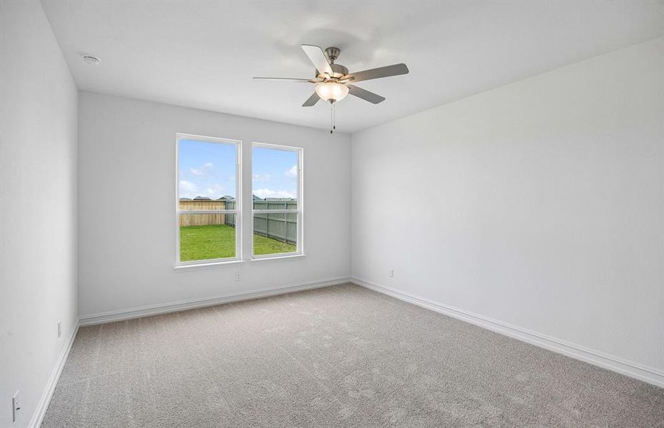 Primary suite with large windows