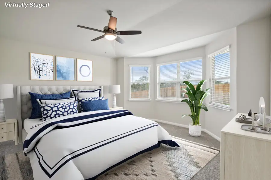 Virtually staged primary suite in a Rio Grande floorplan at a Meritage Homes community.