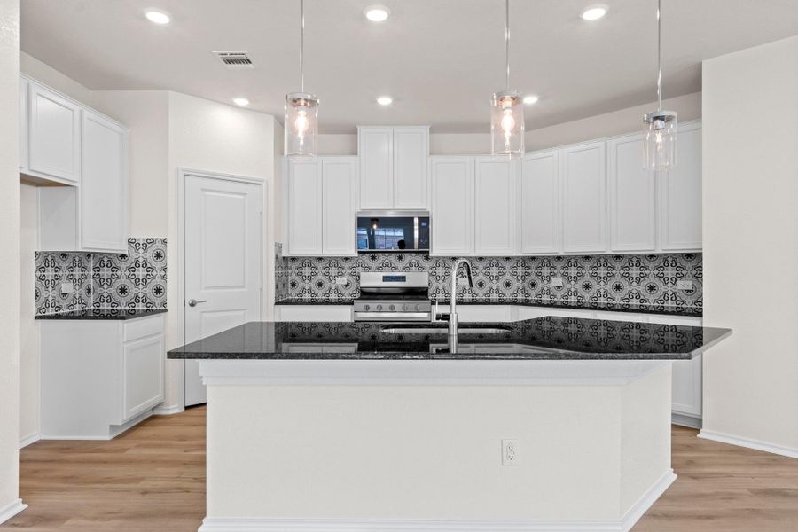 Furnished interior view inside a new home in Salerno - Heritage Collection, Round Rock (Image 8). Furnished interior view inside a new home in Salerno - Heritage Collection, Round Rock (Image 8).