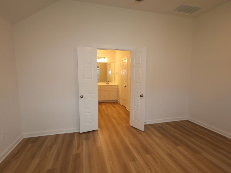 Spacious, unfurnished interior of a new home in Pinewood at Grand Texas, New Caney (Image 23).