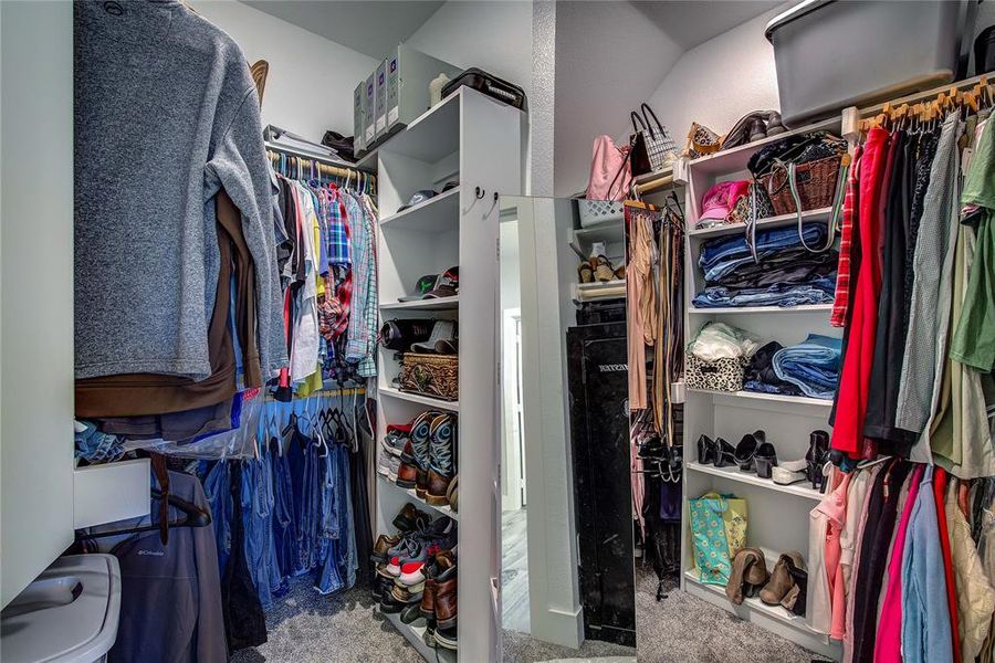 Walk in closet featuring carpet flooring