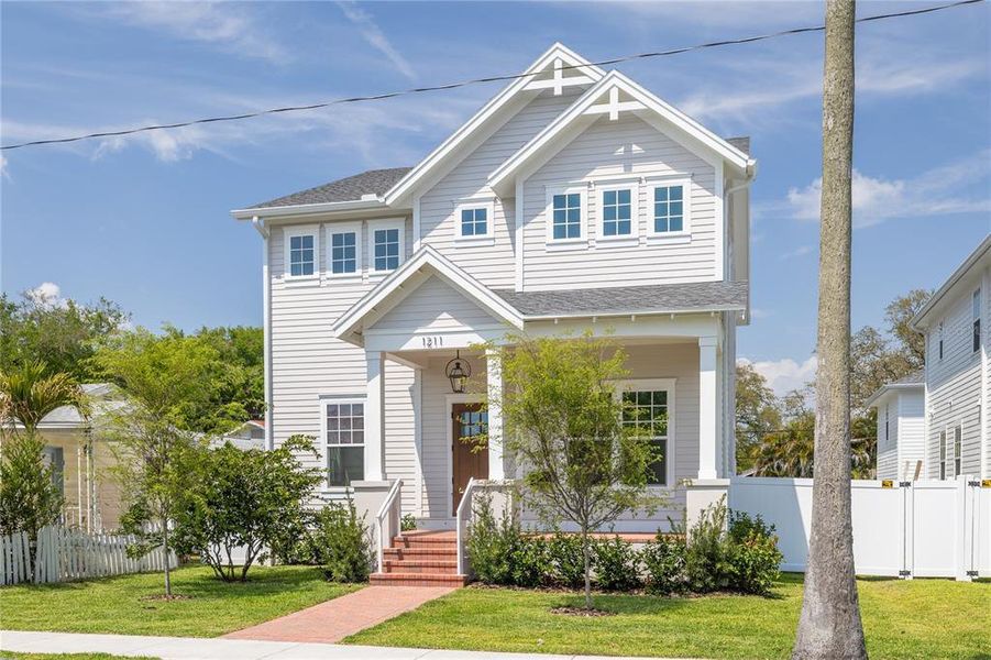 Front exterior of a new home in , St. Petersburg, FL, highlighting curb appeal (Image 21).