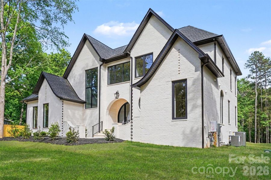 Front exterior of a new home in , Mint Hill, NC, highlighting curb appeal (Image 29). Front exterior of a new home in , Mint Hill, NC, highlighting curb appeal (Image 29).