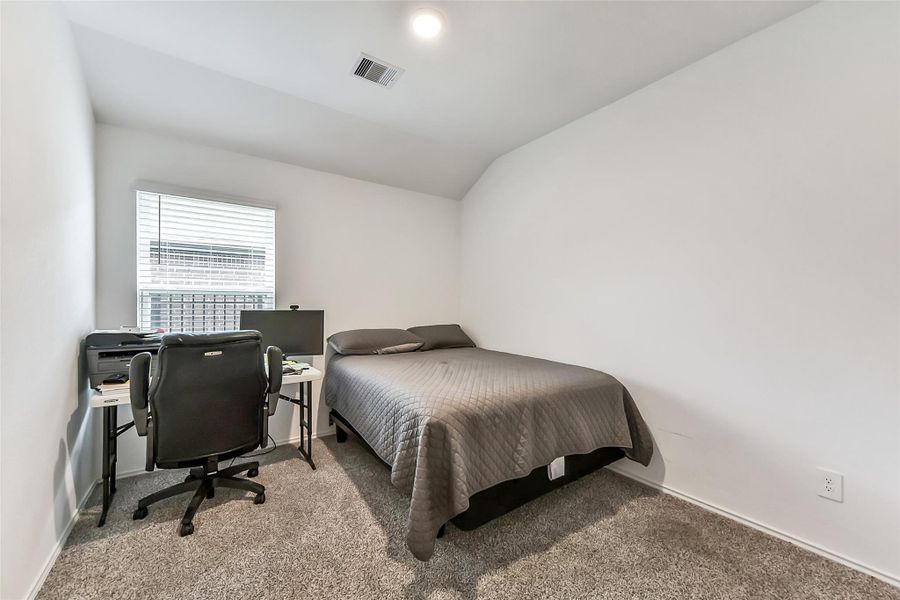 Furnished interior view inside a new home in Sunterra, Katy (Image 31).