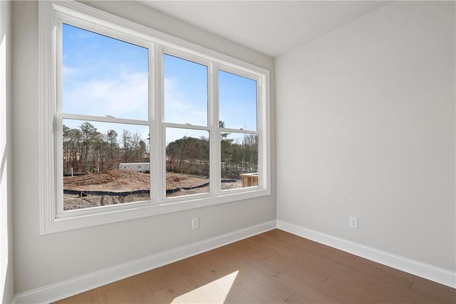 Spacious, unfurnished interior of a new home in Ward's Crossing Townhomes, Johns Creek (Image 28).