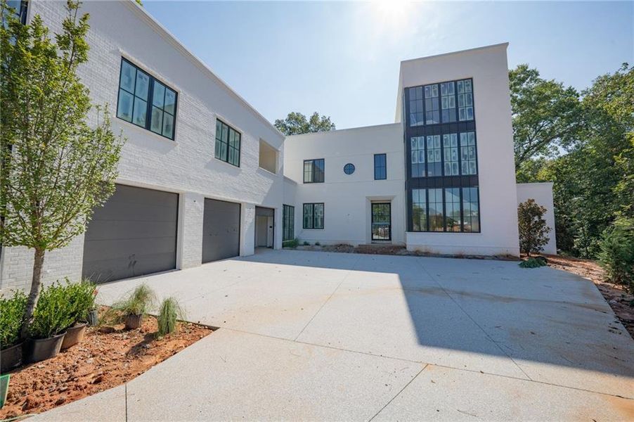 Front exterior of a new home in , Fayetteville, GA, highlighting curb appeal (Image 2).