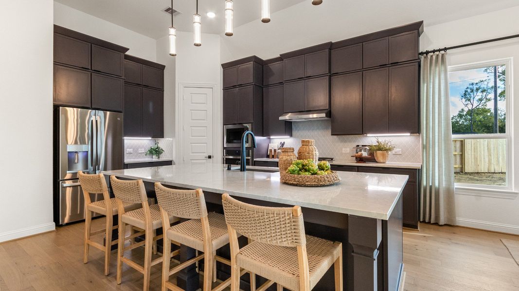 Representative furnished interior of a home built from the Villanova by DRB Homes in Creekhaven, Iowa Colony (Image 5).