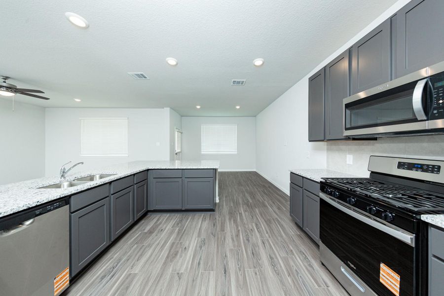 Furnished interior view inside a new home in River's Edge, Conroe (Image 5). Furnished interior view inside a new home in River's Edge, Conroe (Image 5).