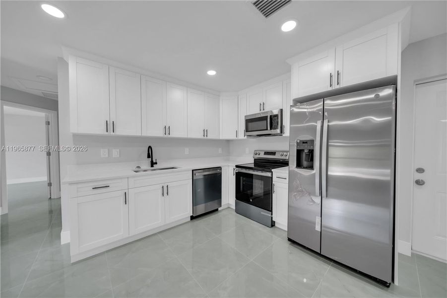 Furnished interior view inside a new home in , Lehigh Acres (Image 4). Furnished interior view inside a new home in , Lehigh Acres (Image 4).