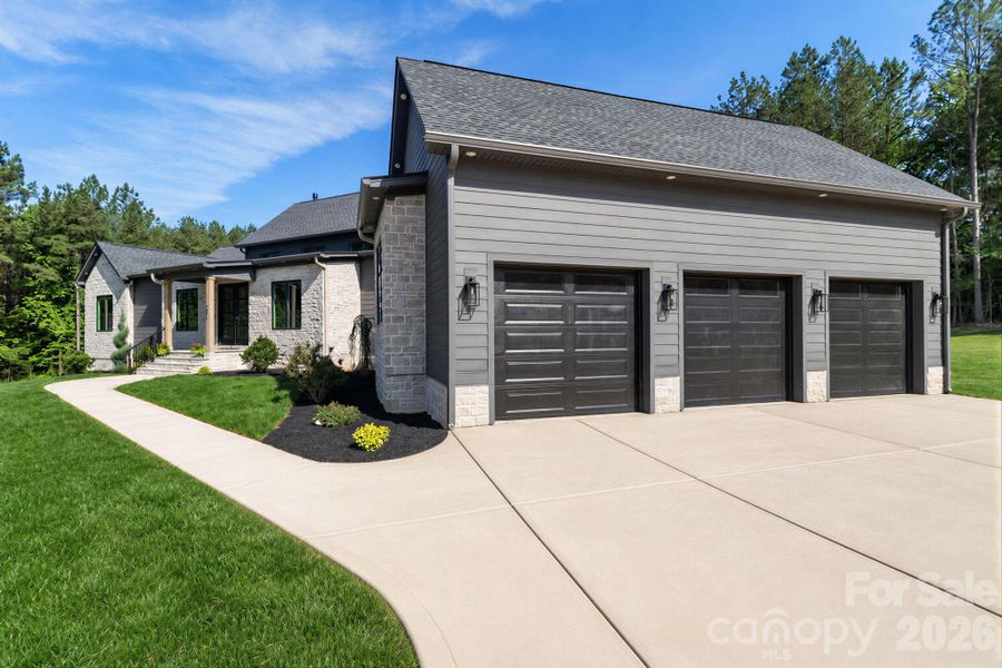 Front exterior of a new home in , Rock Hill, SC, highlighting curb appeal (Image 32).