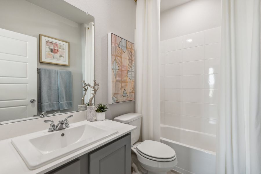 Bathroom in the Winters home plan by Trophy Signature Homes – REPRESENTATIVE PHOTO