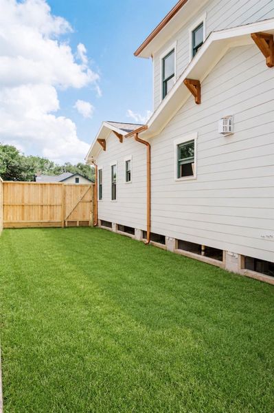 Exterior details and patio area of a home in , Houston (Image 7).