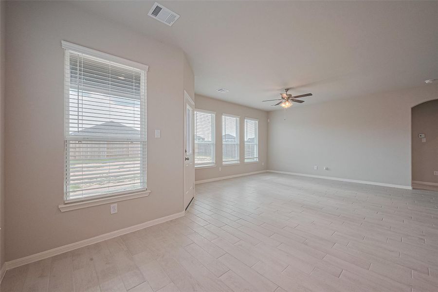Spacious, unfurnished interior of a new home in Sunterra, Katy (Image 23).