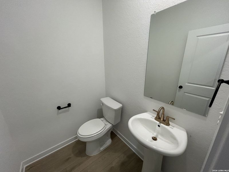 Furnished interior view inside a new home in Hennersby Hollow, San Antonio (Image 9).