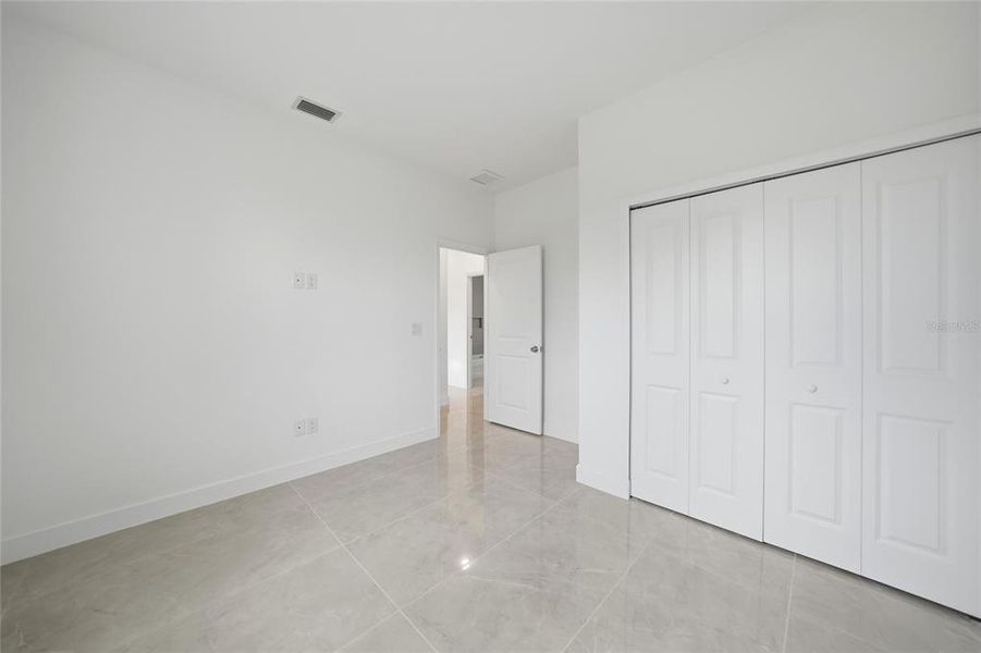 Spacious, unfurnished interior of a new home in , Port Charlotte (Image 20).
